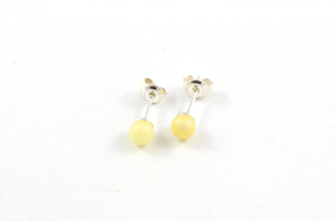 Milky Yellow Baltic Amber and Sterling Silver Round Stud Earrings side view