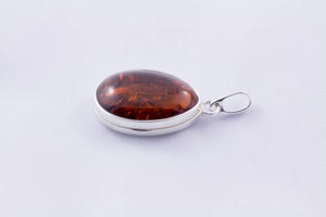 Baltic Amber and Sterling Silver Egg Locket Pendant - cognac, green or cherry colours available