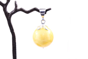 Round 30mm Milky Yellow Baltic Amber and Sterling Silver Pendant